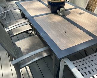 Outdoor Patio Table with 5 Chairs, 40" W x 72" L x 30" H $195