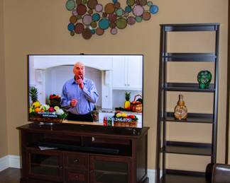 TV stand, Samsung TV, and shelf