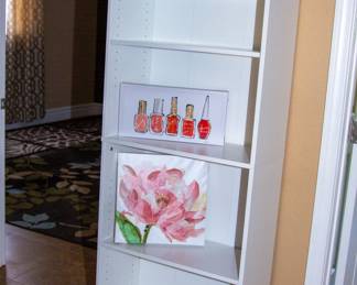 White shelf and artwork