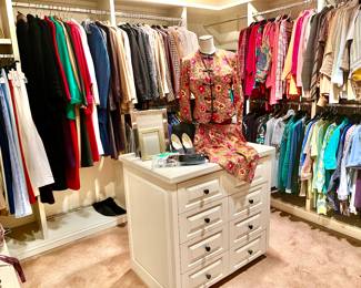 LARGE WOMAN'S MASTER CLOSET.