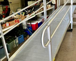15’ aluminum ramp for handicap accessibility. Hand rails.