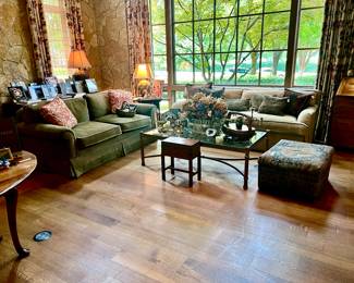 LARGE LIVING ROOM WITH ASIAN DECOR.