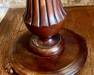 BASE OF AN ANTIQUE PLANT STAND.