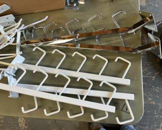 Free Hook waterfall grid hooks/Hanging on the wall or racking to hang purses clothes in a shop or garage or a business $5 dollars each or make offer to buy all