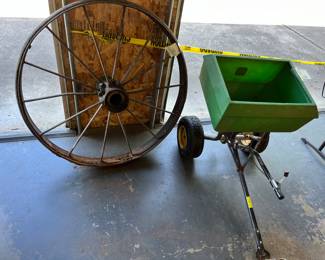 Not free antique wagon wheel $35
Not free John Deere broadcast spreader pull behind lawnmower $50
