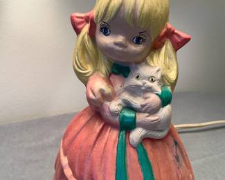 Detail of girl holding cat