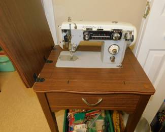 Sewing Machine In Cabinet