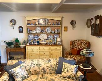 blue and white ceramics, couch, pair Tiffany lamps, clocks 