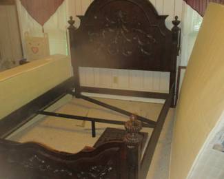 Queen size bed, carved headboard 