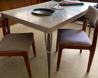 The Classic Formica Table with 2 Leaves. And a pair of Mid Century Modern Chairs. 