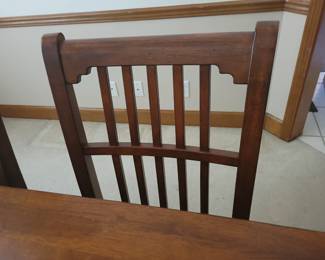 STUNNING ASHLEY DINING TABLE LIKE NEW WITH 6 CHAIRS-THIS IS SOLID AND WHAT I LOVE ABOUT IT IS THAT IT IS SLIGHTLY NARROWER THAN MOST TABLES FOR A BETTER FIT FOR MOST ROOMS. OUR PRICE $200