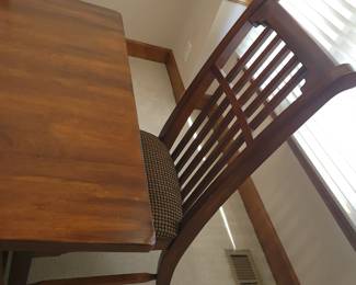 STUNNING ASHLEY DINING TABLE LIKE NEW WITH 6 CHAIRS-THIS IS SOLID AND WHAT I LOVE ABOUT IT IS THAT IT IS SLIGHTLY NARROWER THAN MOST TABLES FOR A BETTER FIT FOR MOST ROOMS. OUR PRICE $200