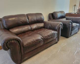 Italian leather Loveseat and matching Chair with nail head trim. $200 LOVESEAT/$150 CHAIR