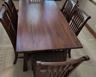 STUNNING ASHLEY DINING TABLE LIKE NEW WITH 6 CHAIRS-THIS IS SOLID AND WHAT I LOVE ABOUT IT IS THAT IT IS SLIGHTLY NARROWER THAN MOST TABLES FOR A BETTER FIT FOR MOST ROOMS. OUR PRICE $200