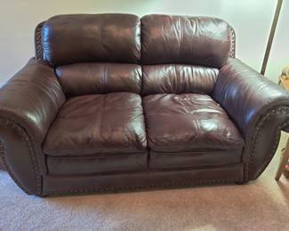 Italian leather Loveseat and matching Chair with nail head trim. $200 LOVESEAT/$150 CHAIR