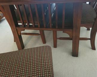 STUNNING ASHLEY DINING TABLE LIKE NEW WITH 6 CHAIRS-THIS IS SOLID AND WHAT I LOVE ABOUT IT IS THAT IT IS SLIGHTLY NARROWER THAN MOST TABLES FOR A BETTER FIT FOR MOST ROOMS. OUR PRICE $200