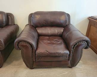 Italian leather Loveseat and matching Chair with nail head trim. $200 LOVESEAT/$150 CHAIR