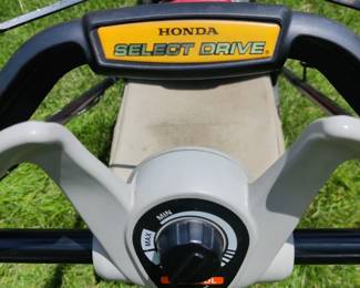 Honda HRX 217 self propelled lawn mower, self propelled, adjustable speed,  easy start mulcher & bagger-$150