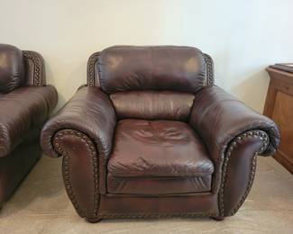 Italian leather Loveseat and matching Chair with nail head trim. $200 LOVESEAT/$150 CHAIR