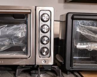 Brand new Kitchenaid toaster oven with accessories. Lightly used Bravetti toaster oven with all accessories including pizza stone.
