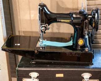 Vintage Singer sewing machine with case.
