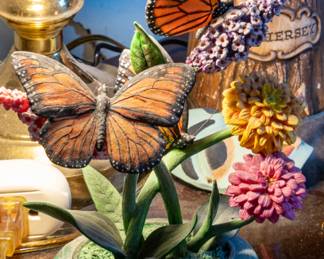 "Graceful Monarchs" by the Danbury Mint.  8.5" high x 6.5" wide x 5" deep. Marked on bottom "Graceful Monarchs by Danbury Mint."