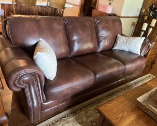 Leather couch with hobb nails like new condition 