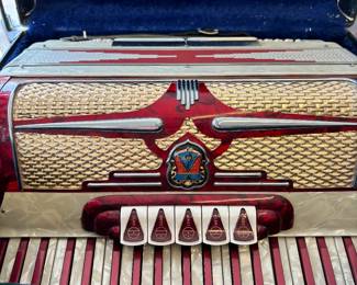 Accordian made in Italy. Cherry Red. Case in excellent condition.