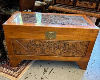 Vintage Oriental Camphor Wood Style Heavily Carved Chest. Glass on lid that is also carved. Grass Clasp