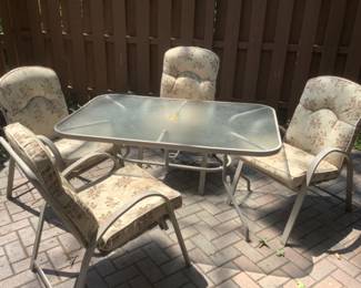 Outdoor patio set with cushions.  Presale $100