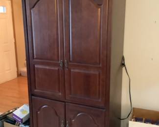 Armoire…holds tv.  Presale $25