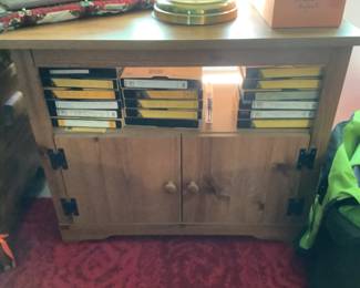 Older tv stand  and tapes 