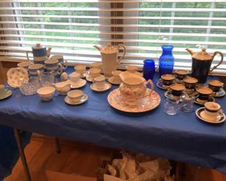 Teapot sets and cups and saucers