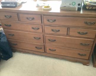 Maple dresser measures 50” w x 18” d x 31” t.  Presale $165.  Has a matching headboard.