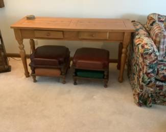 Sofa table and set of four antique footstools