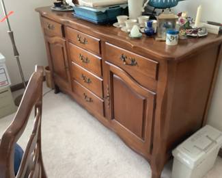 Drexel Buffet measures61” l x 21” w x 34” h.  Matches dining table 