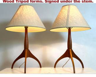 Lot 786 Pr Shaker Workshops Table Lamps. Wood Tripod forms. Signed under the stem. 