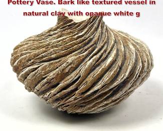 Lot 711 ANN GOLDMAN American Art Pottery Vase. Bark like textured vessel in natural clay with opaque white g