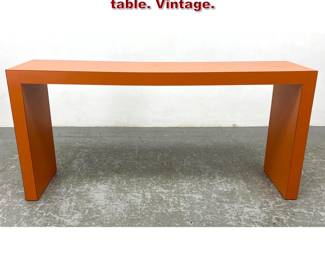 Lot 859 Orange color laminate parsons table. Vintage. 