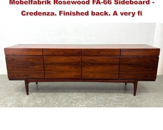 Lot 600 Ib KofodLarsen for Faarup Mobelfabrik Rosewood FA66 Sideboard  Credenza. Finished back. A very fi
