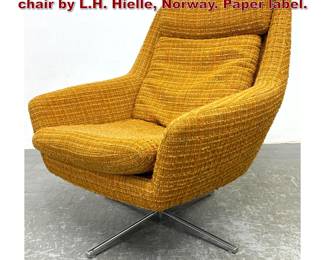 Lot 1049 Danish Modern swiveling lounge chair by L.H. Hielle, Norway. Paper label.