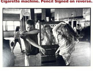 Lot 974 BRUCE DAVIDSON Photograph. Cigarette machine. Pencil Signed on reverse. 