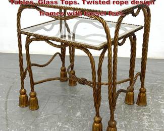 Lot 1117 2pc Nesting Gilt Metal Italian Side Tables. Glass Tops. Twisted rope design frames with tassel feet.