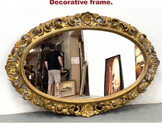 Lot 1178 Large Antique Oval Gilt Wall Mirror. Decorative frame. 