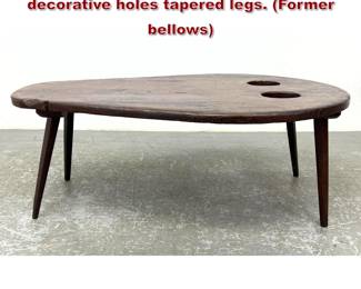 Lot 818 Pine coffee table with Large decorative holes tapered legs. Former bellows