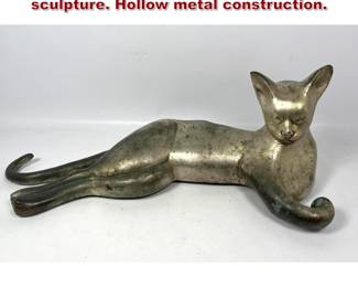 Lot 896 Oversized, metal reclining cat sculpture. Hollow metal construction. 