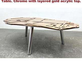 Lot 1133 Fernando Compana Brasilia Coffee Table. Chrome with layered gold acrylic top. 