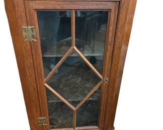 $170 USD     Vintage Georgian Glass Paned Front Corner Cabinet EK221-128    Add some vintage charm to your space with this Georgian style corner cabinet. Featuring glass paned doors, it's perfect for displaying your favorite trinkets (or hiding your secret snacks!). Perfect for adding character to any room!
Dimensions: 27 x 14 x 41"H
Condition: Good Condition.
Local pick up Merrifield, VA.  Please contact us for shipper suggestions.