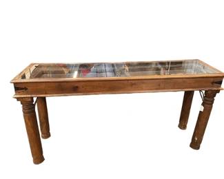 $400 USD     Vietnamese Carved Hard Wood /Glass Top Door Console Table EK221-23    Experience the elegance of Vietnamese craftsmanship with our Carved Hard Wood /Glass Top Door Console Table. The intricate carvings on the solid wood paired with the sleek glass top creates a stunning and exclusive piece for your home. Bring sophistication and glamour to any space with this luxurious console table.

Dimension: 63 x 18 x 31"H

Condition: Very good condition.  

Local pick up Merrifield, VA.  Contact us for shipper suggestions.