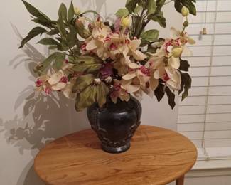 Floral arrangement in black vase